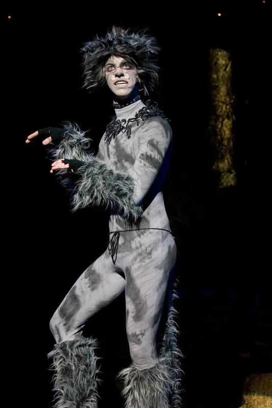 Sean Michael Palmer acting as Munkustrap